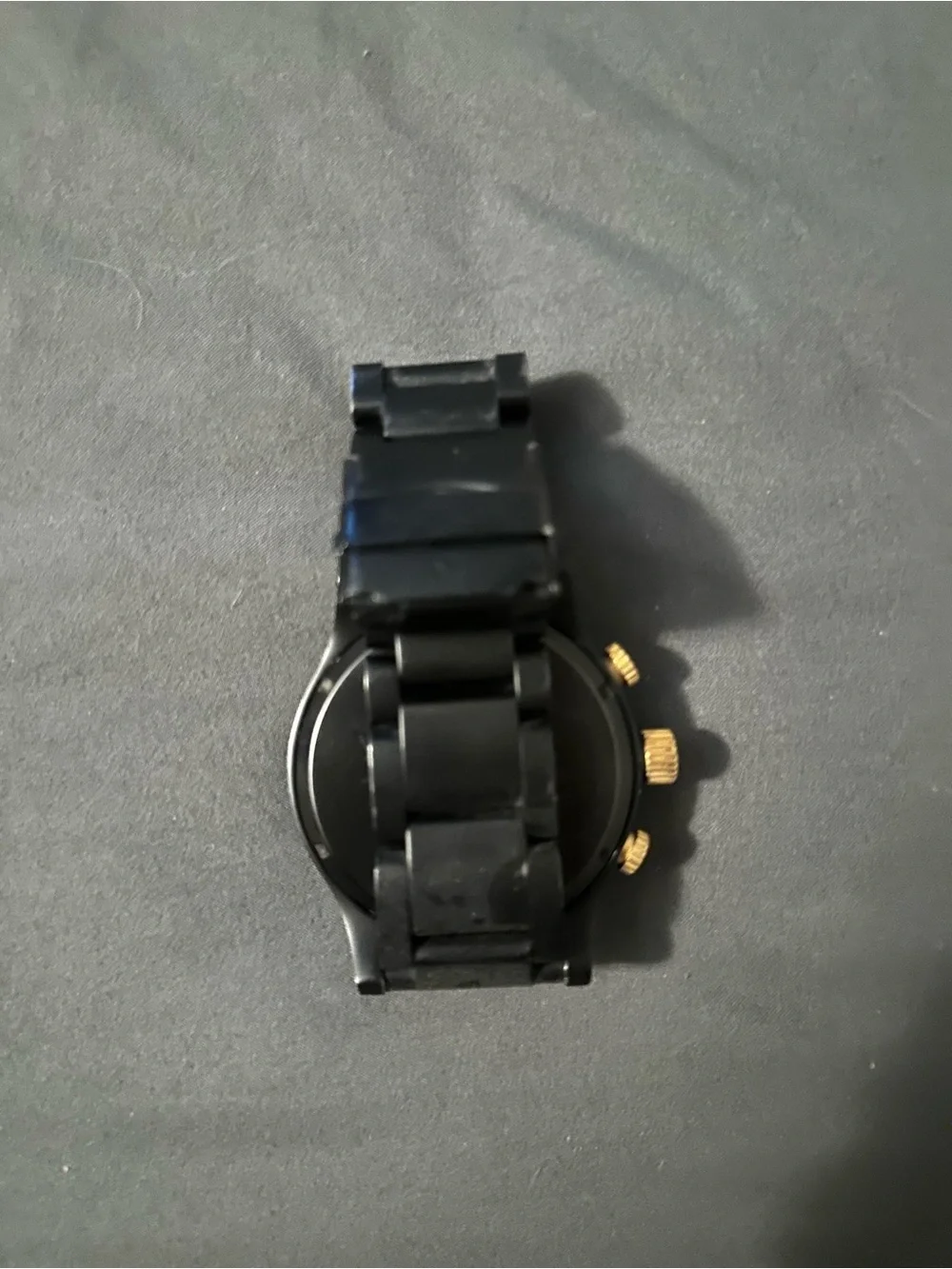 Nixon Men’s Black and Gold Chronograph Watch